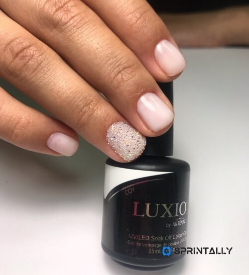 Manicure with sparkles or rhinestones